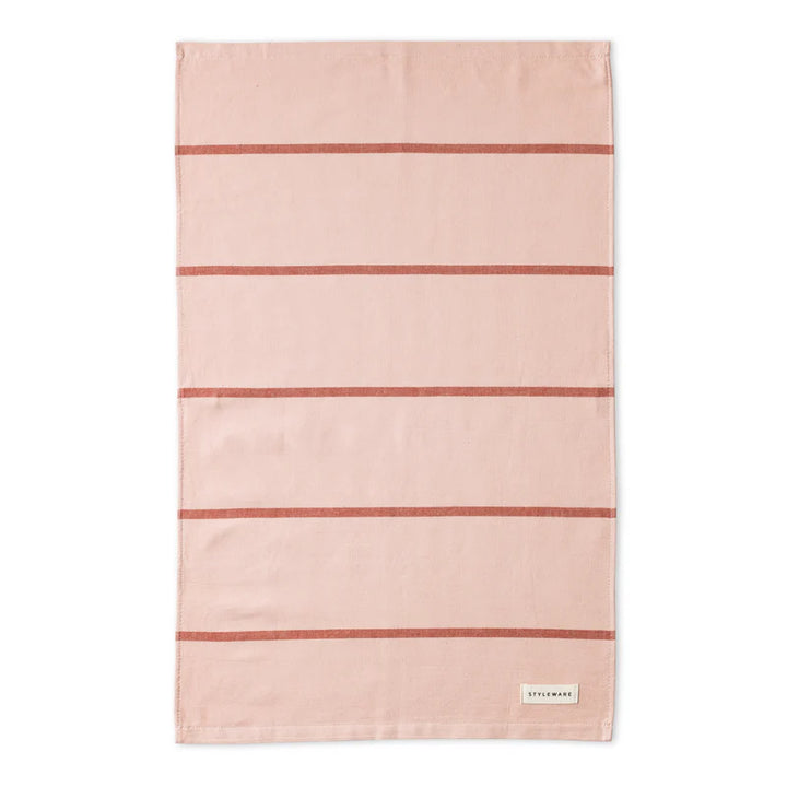 Pink tea towel with red stripes on a white background