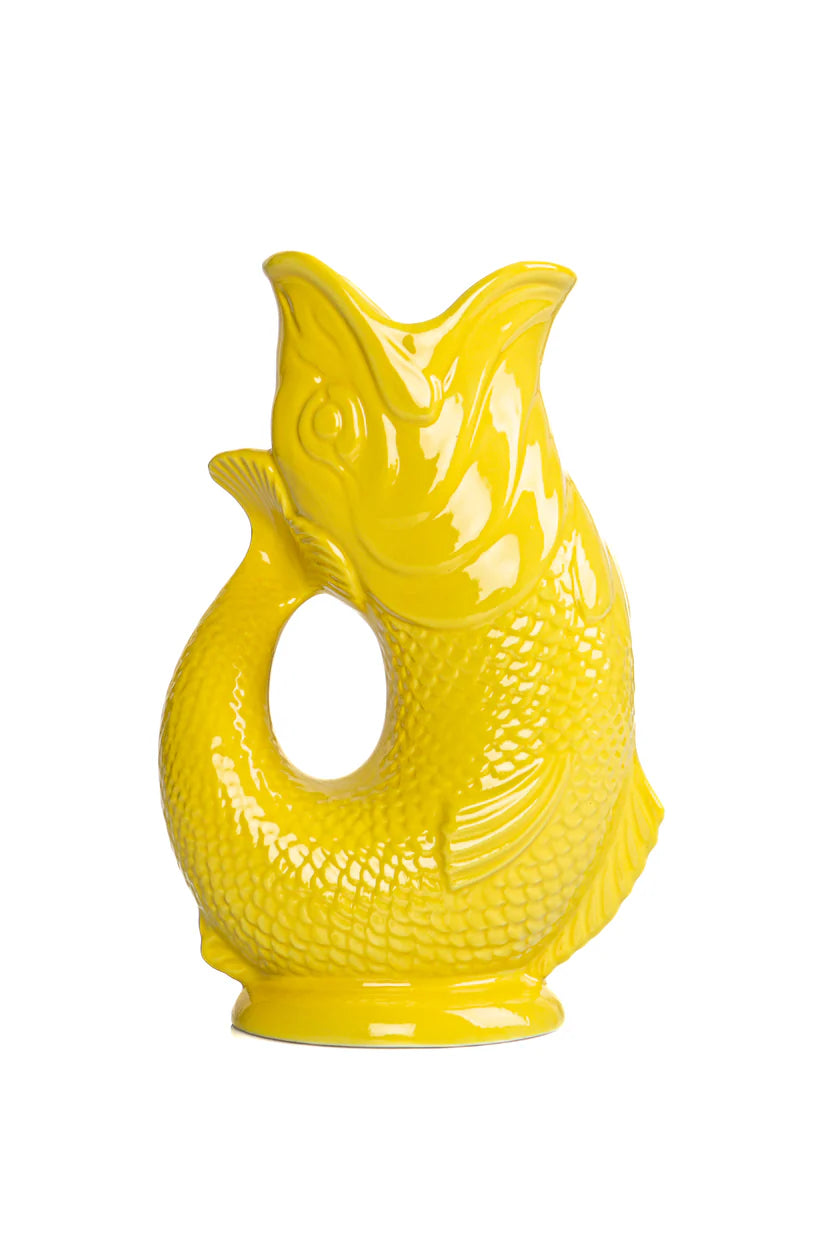 Yellow ceramic fish-shaped vase on a white background