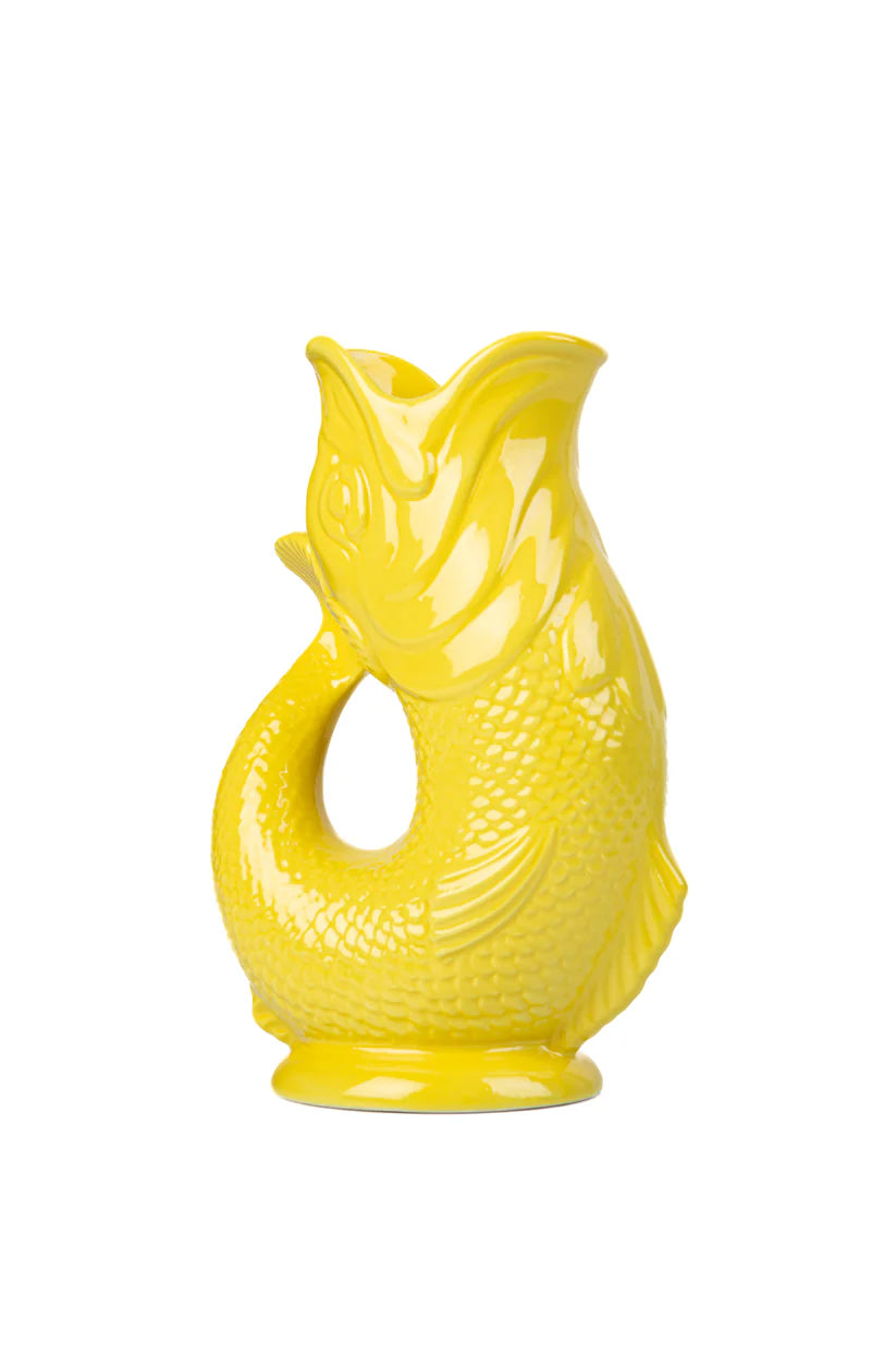 Yellow fish-shaped vase on a white background