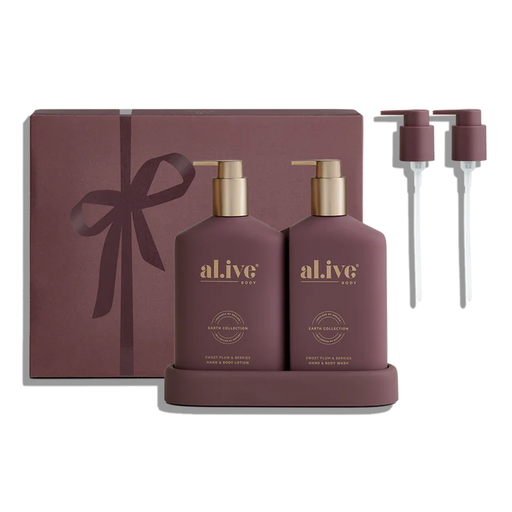 Maroon 'al.ive' skincare set with bottles, pump, and box on a white background