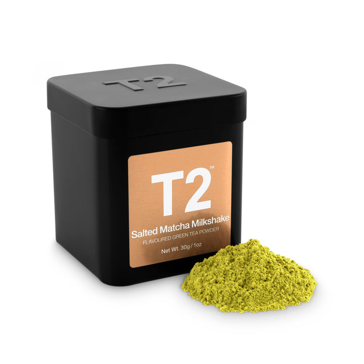 Black container of T2 Salted Matcha Milkshake green tea powder on a white background