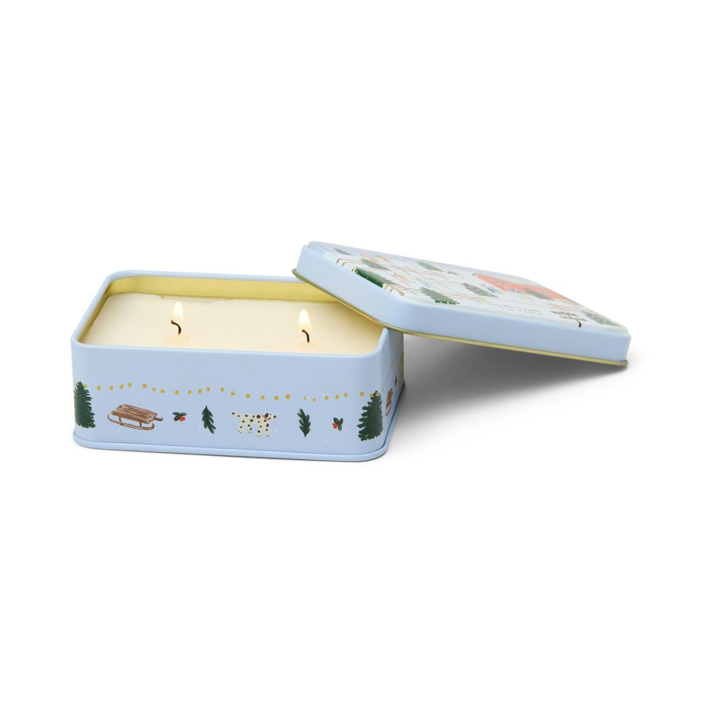 Candle in a decorative tin with illustrations on a white background