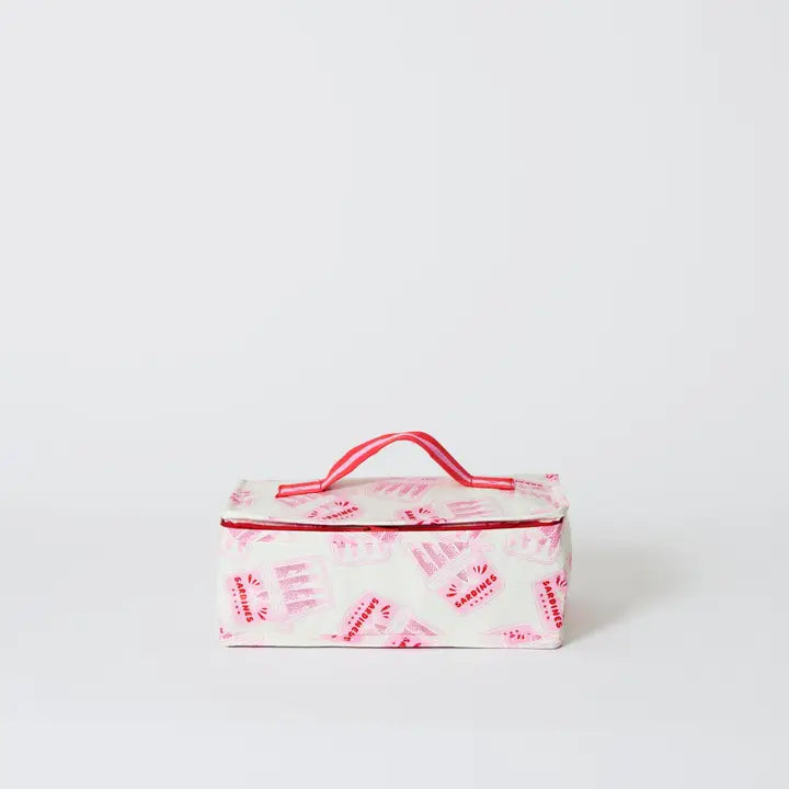 Small rectangular insulated lunch bag with a pink handle on a white background