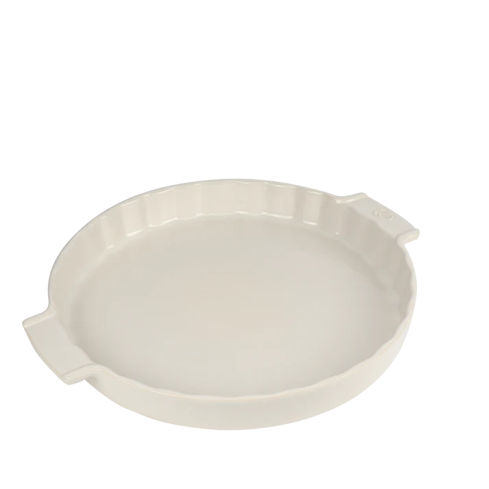White ceramic pie dish on a white background