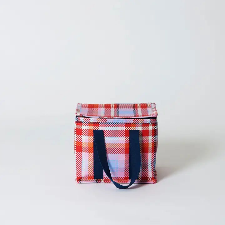 Plaid patterned bag with blue handles on a white background