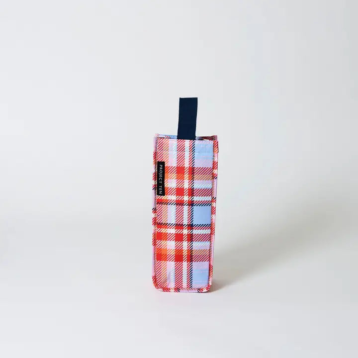 Plaid-patterned product packaging on a white background