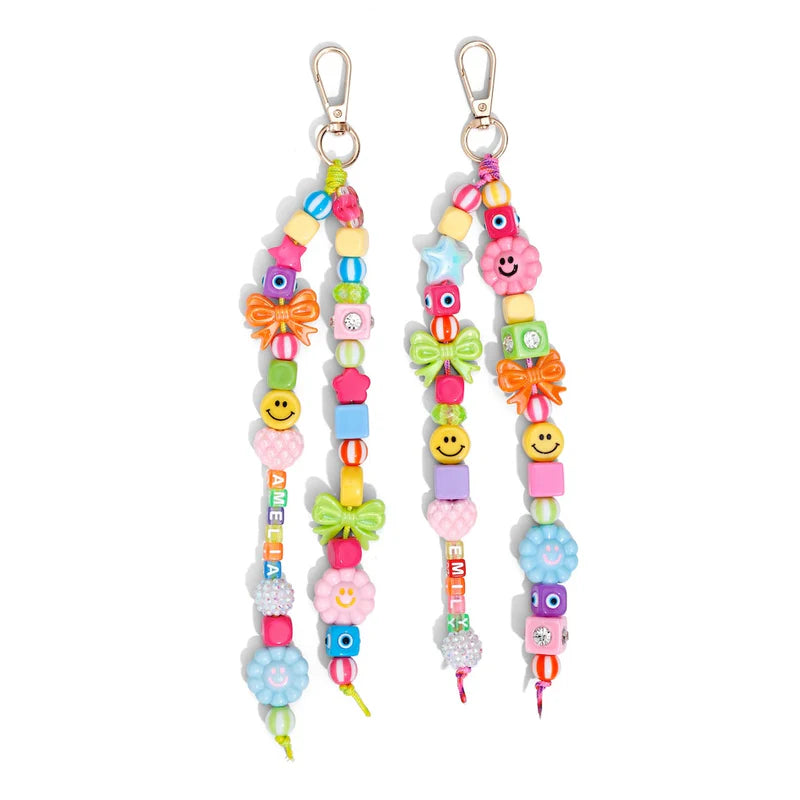 Two colorful beaded keychains with various shapes and patterns on a white background.