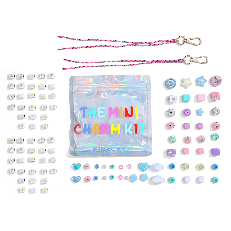 Holographic charm kit with various charms and a lanyard on a white background