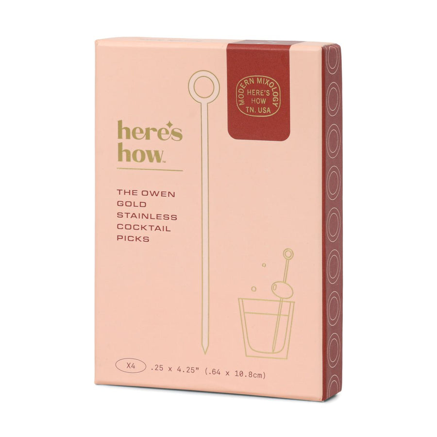 Here's How cocktail picks in a pink box on a white background
