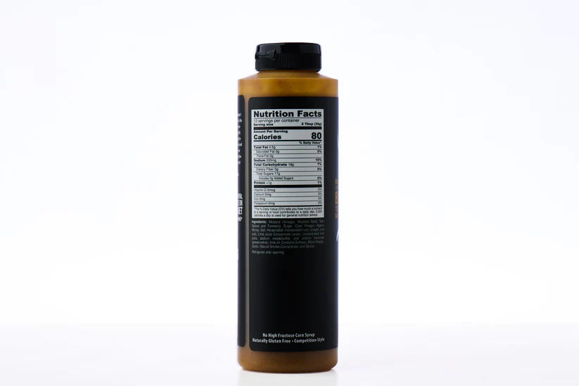 Bottle of barbecue sauce with nutrition facts label on a white background