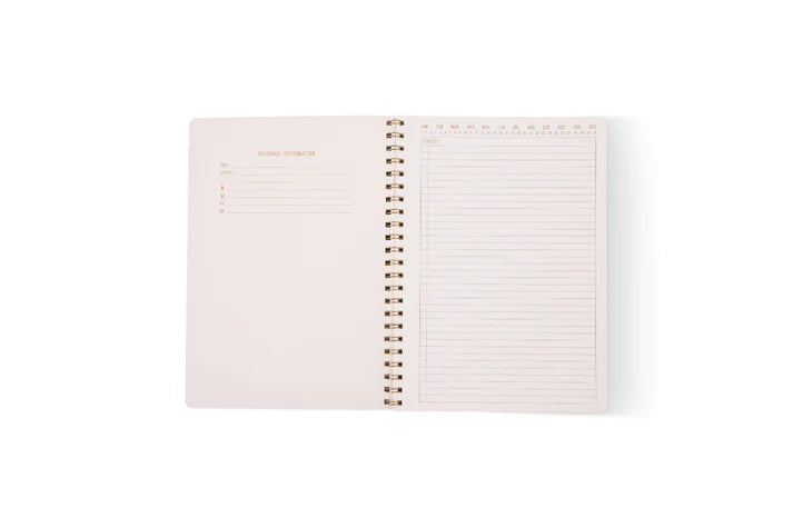 Open spiral-bound notebook with lined pages on a white background