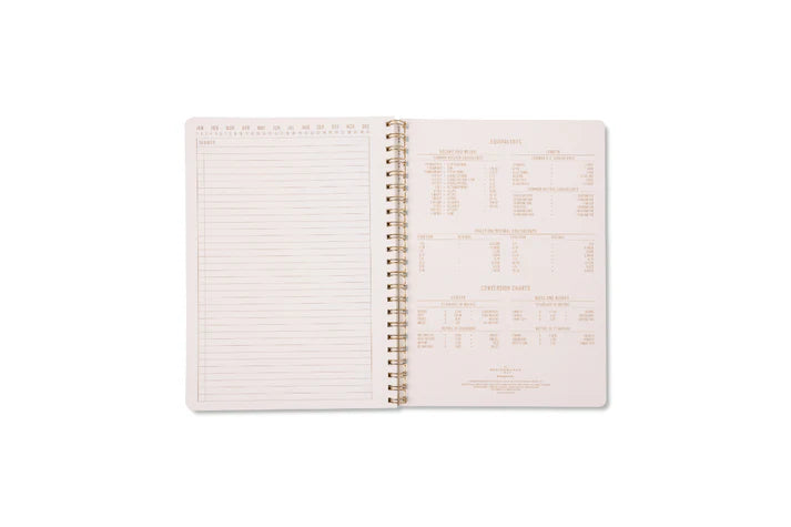 Open planner with monthly and weekly layout on a white background