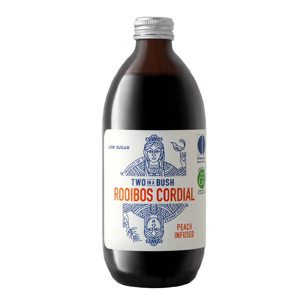 Bottle of Two in a Bush Rooibos Cordial with a white label on a white background