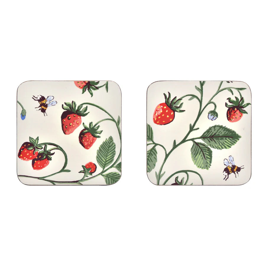 Two square coasters with strawberry design on a white background