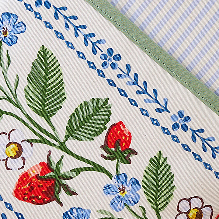 Close-up of a fabric with strawberry and floral pattern