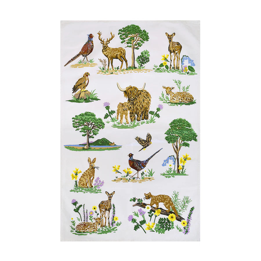 Tea towel with nature-themed design featuring animals and plants on a white background