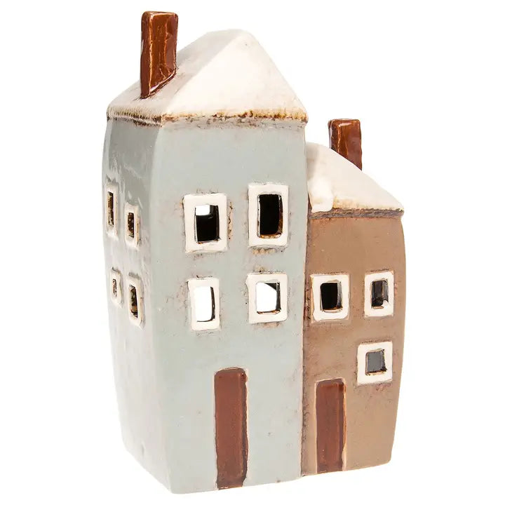 Two ceramic houses tealight candle holder on a white background
