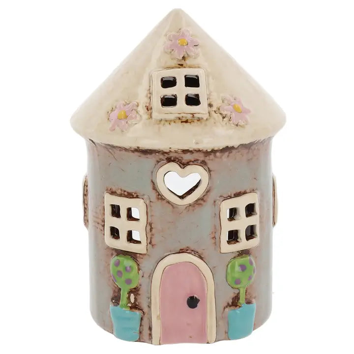 Ceramic tealight holder by Village Pottery on white background 
