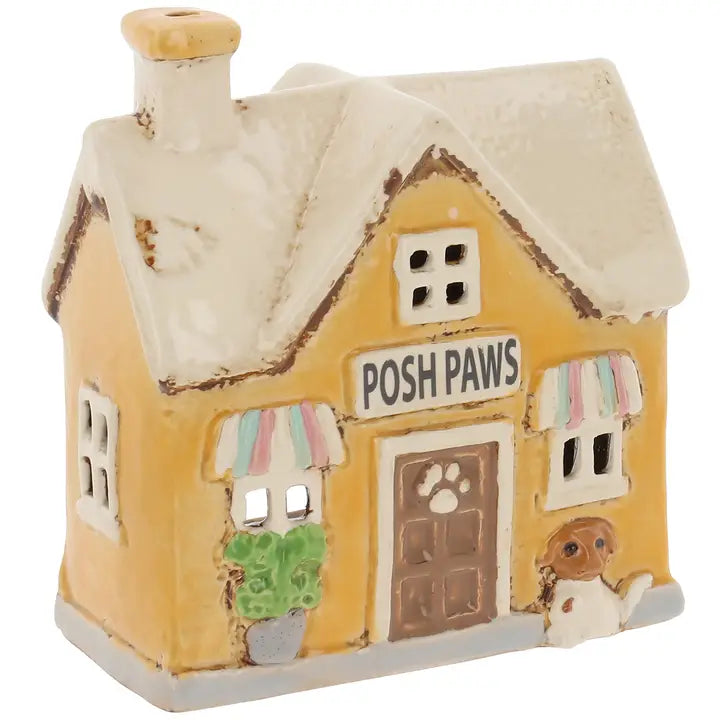 Small ceramic house  tealight holder  with 'Posh Paws' sign on a white background