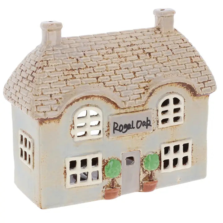 Ceramic tealight holder by Village Pottery on white background 