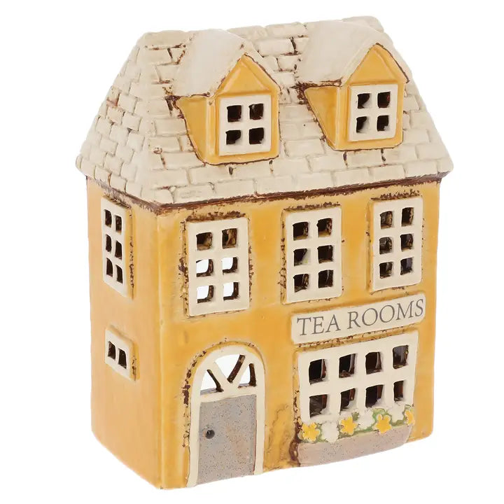Ceramic tealight holder by Village Pottery on white background 