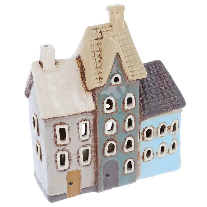 Ceramic tealight holder by Village Pottery on white background 