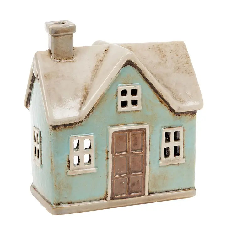 Village Pottery ceramic  tealight holder house on a white background
