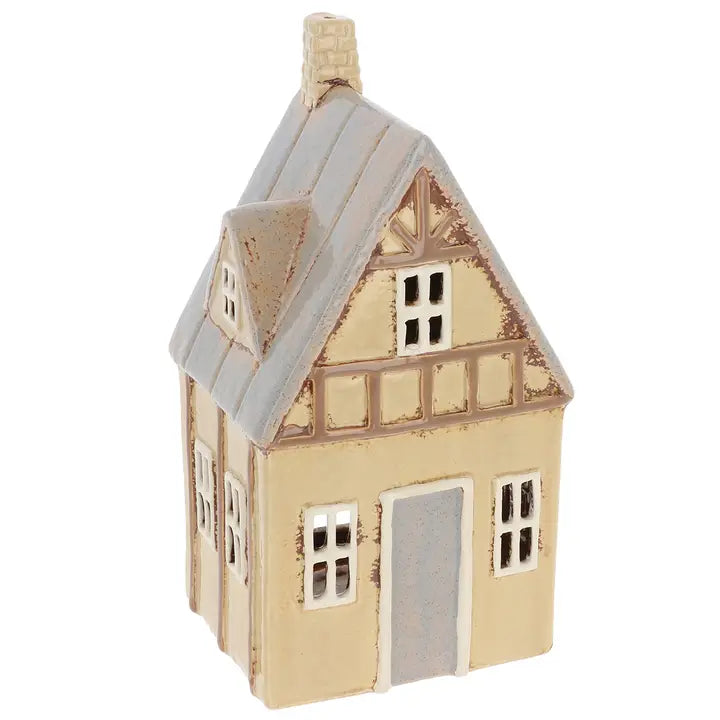 Ceramic tealight holder by Village Pottery on white background 