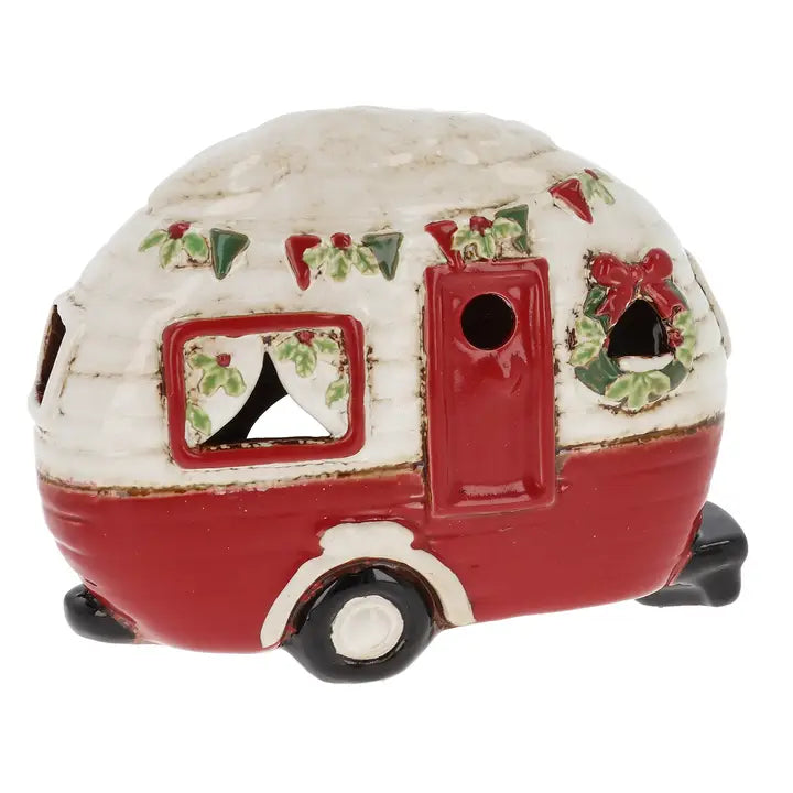 Decorative Christmas-themed camper tealight holder on a white background