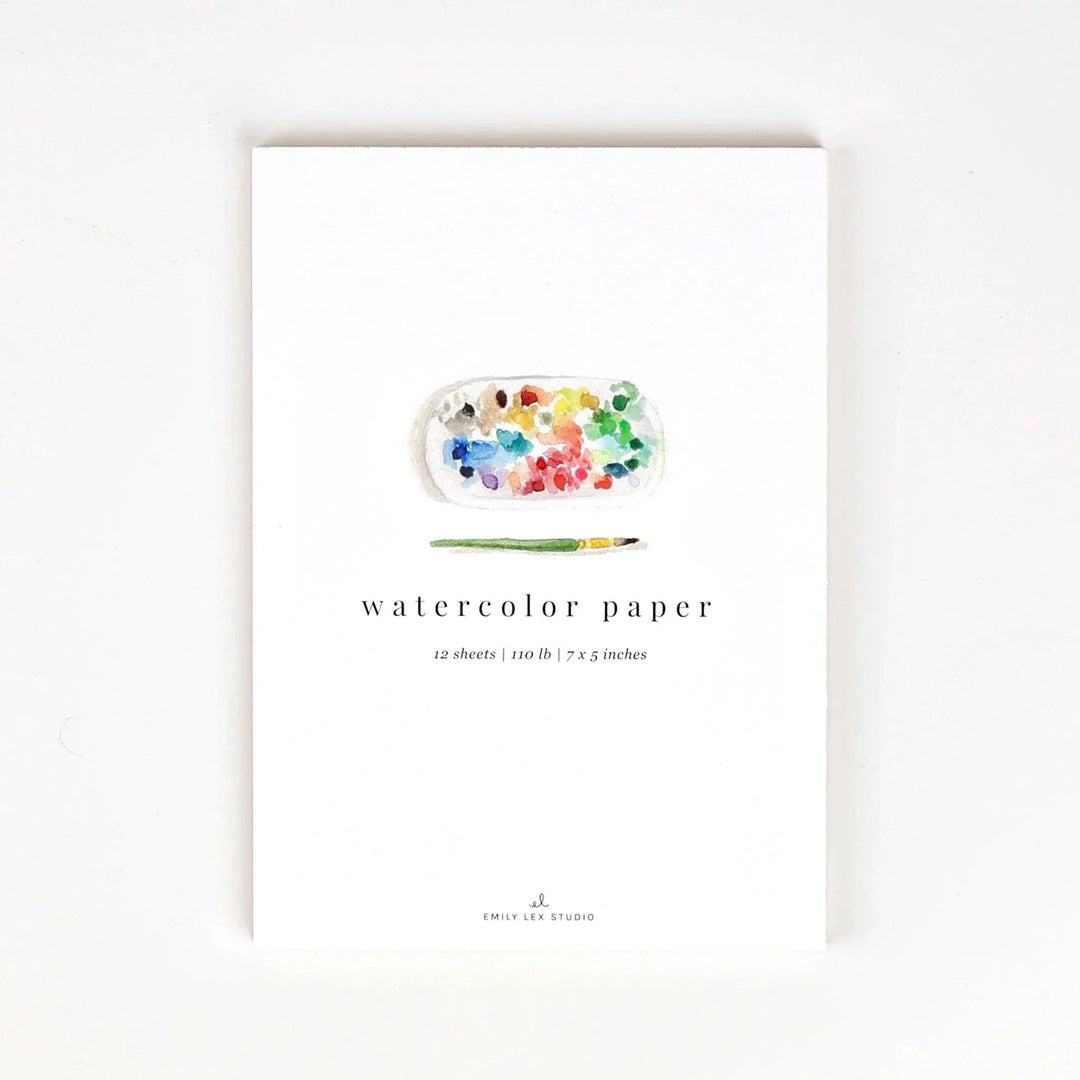 Watercolor paper packaging with a paint palette illustration on a white background