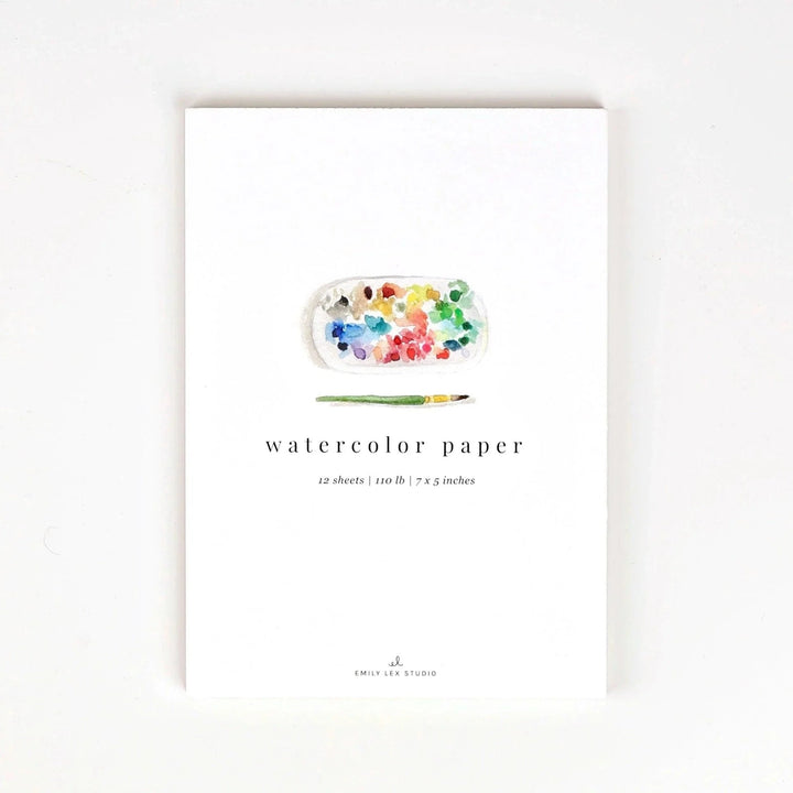Watercolor paper packaging with a paint palette illustration on a white background
