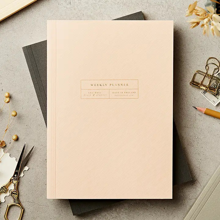 Beige planner with &