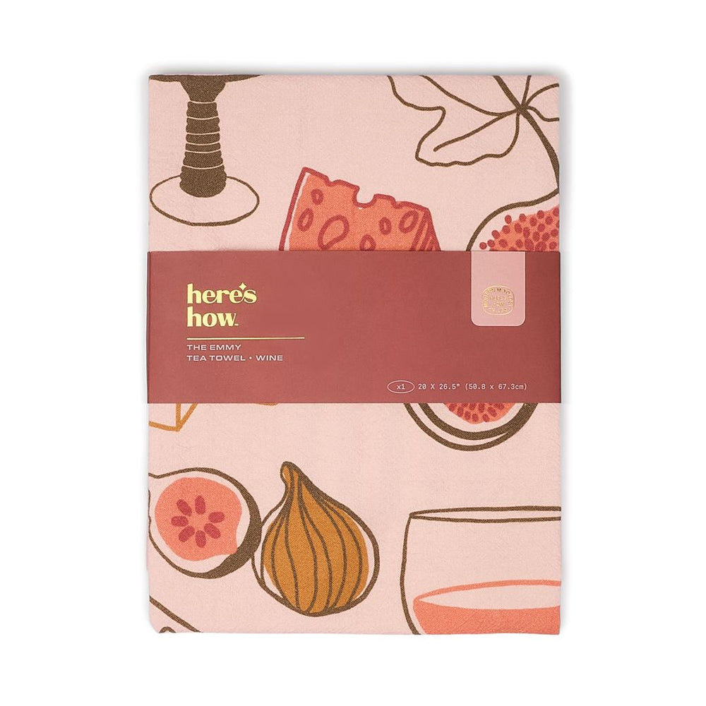 Tea towel with wine-themed design and 'here's how' branding on a white background