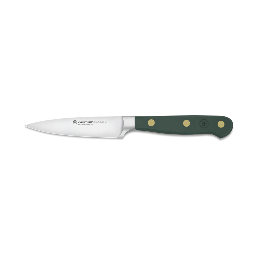 Knife with a green handle on a white background