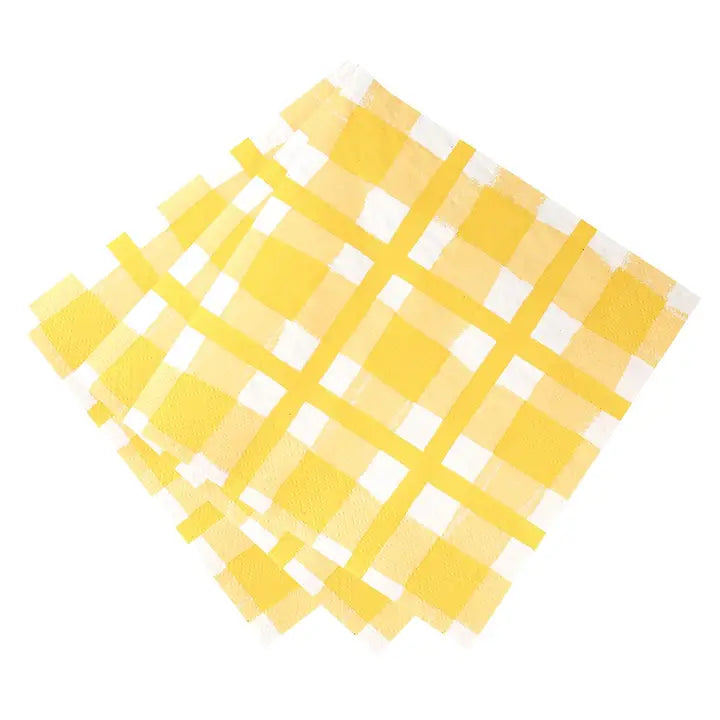 Yellow napkin with a grid pattern on a white background
