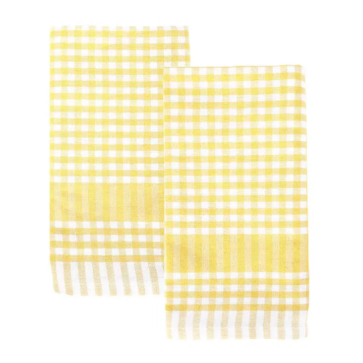 Yellow and white gingham napkins on a white background