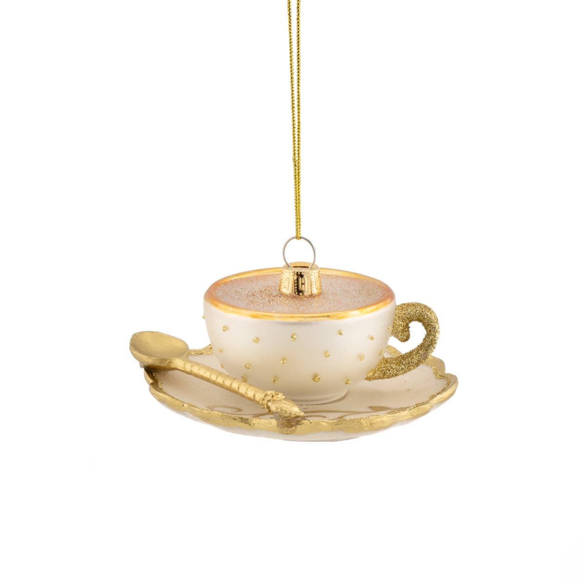 Decorative teacup and saucer ornament with gold accents on a white background