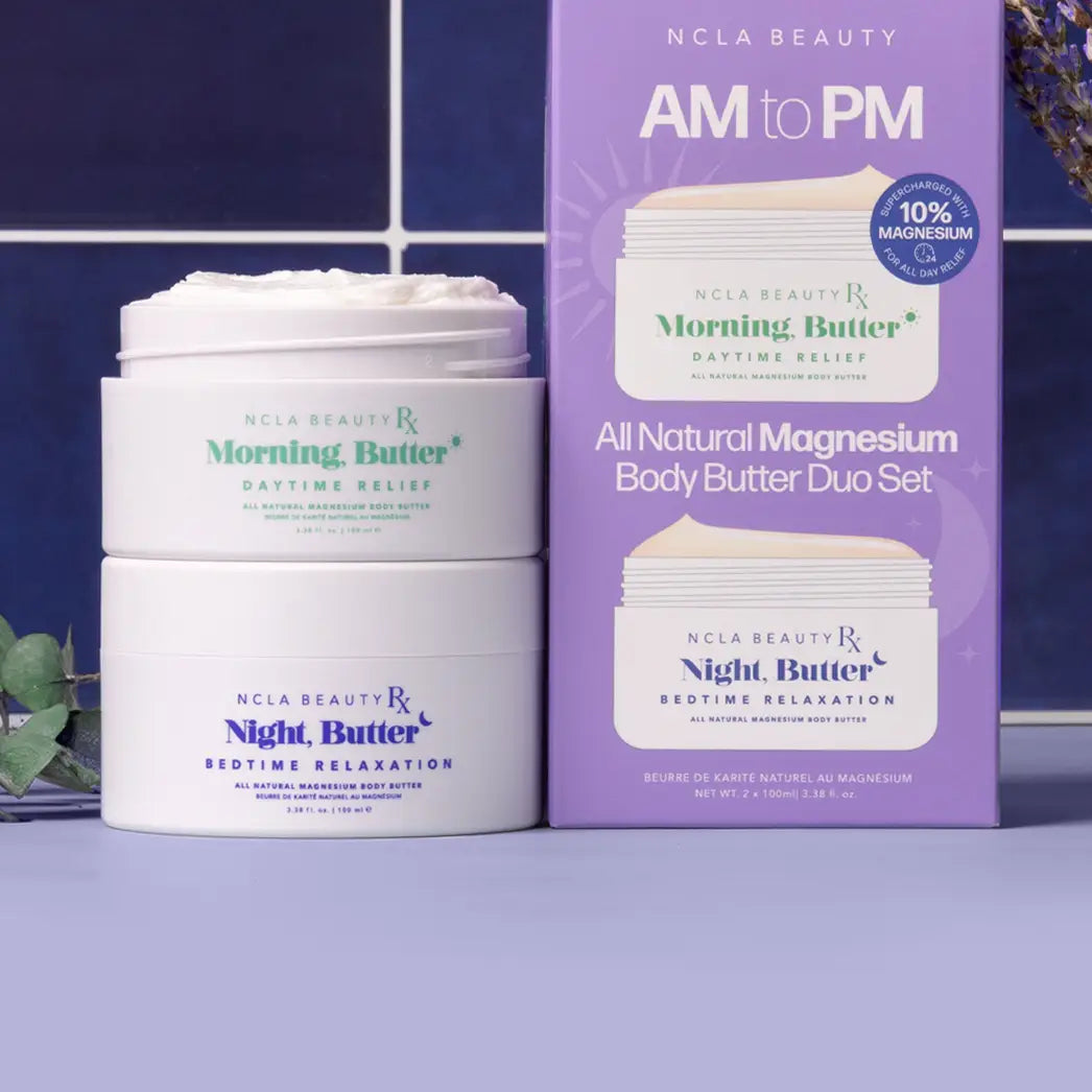 NCLA Beauty AM to PM All Natural Magnesium Body Butter Duo Set with two jars and a packaging box on a blue background.