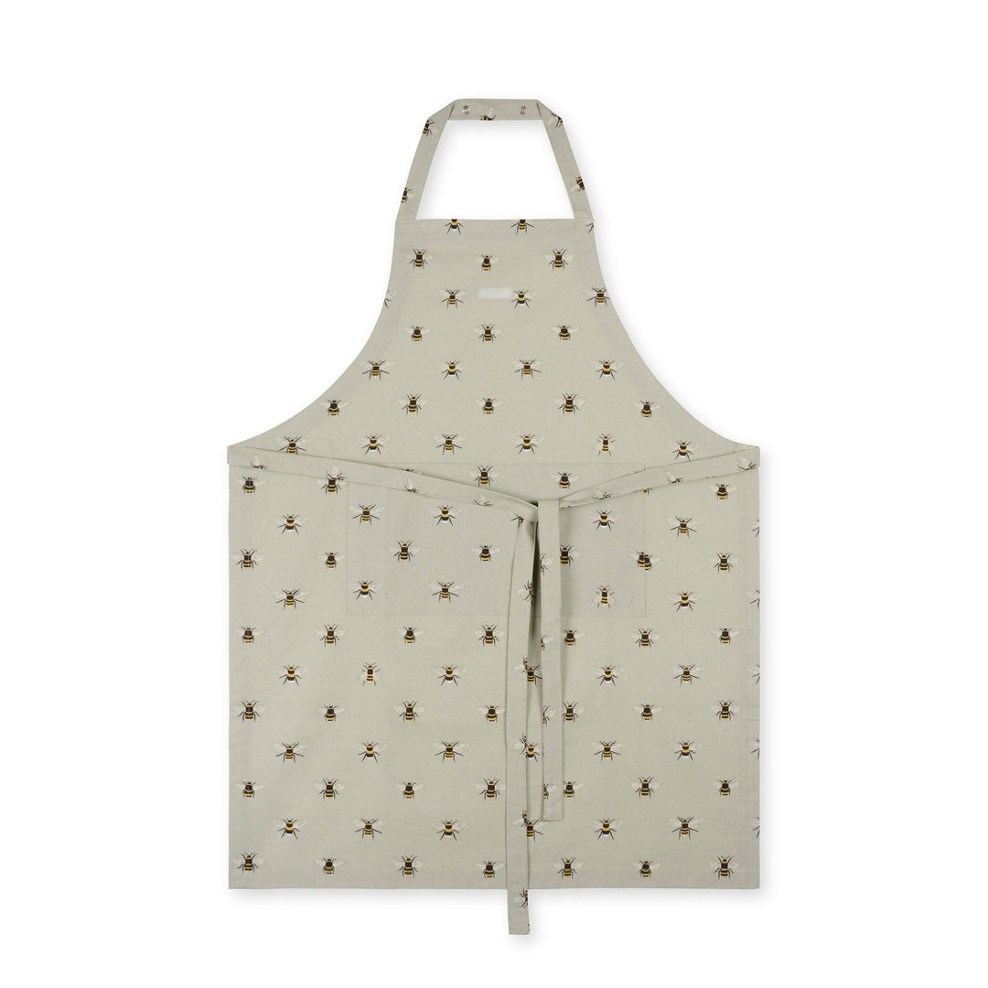 Fabric apron with small bee pattern on a white background