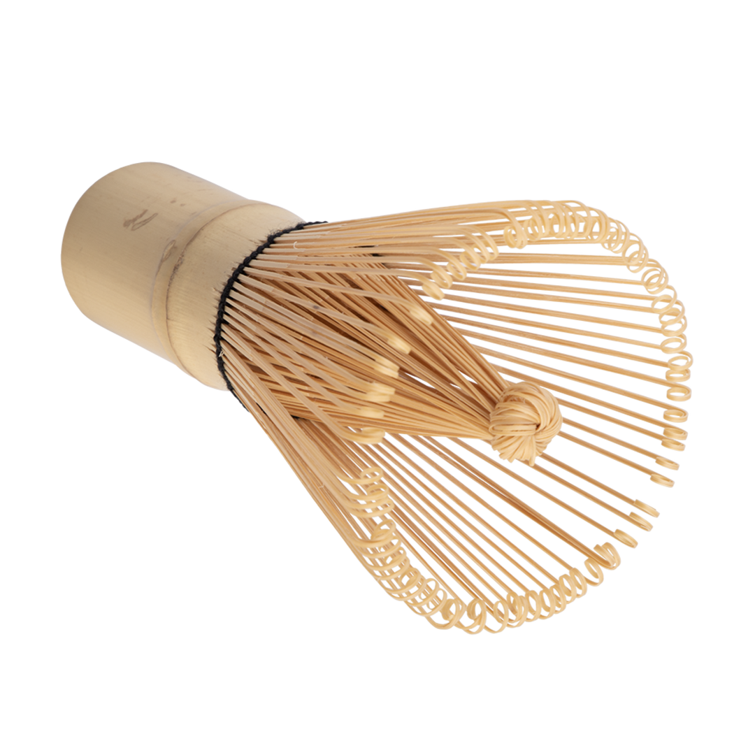 Bamboo whisk used for making matcha tea on a white background