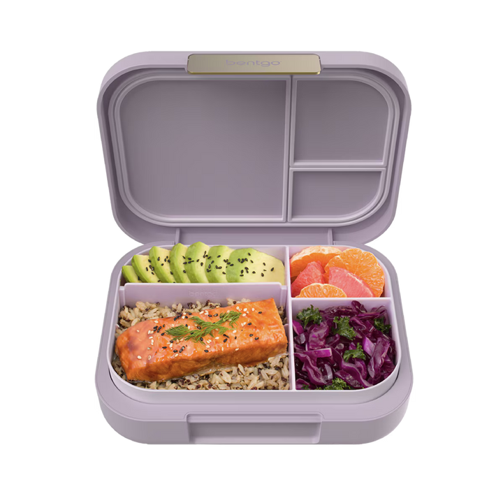 Orchid bento box with compartments containing salmon, avocado, and other ingredients on a white background