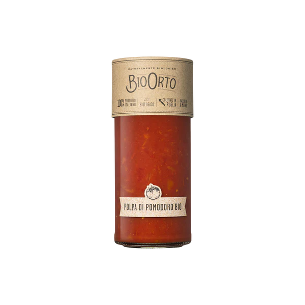 Tube of BioOrto tomato paste on a white background