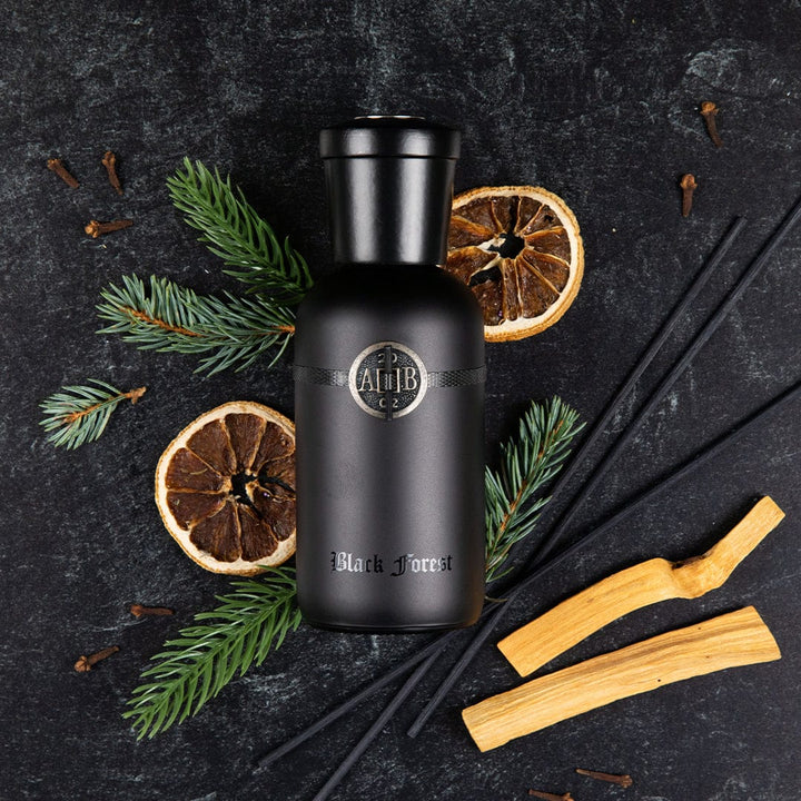 Black bottle with decorative elements on a dark background