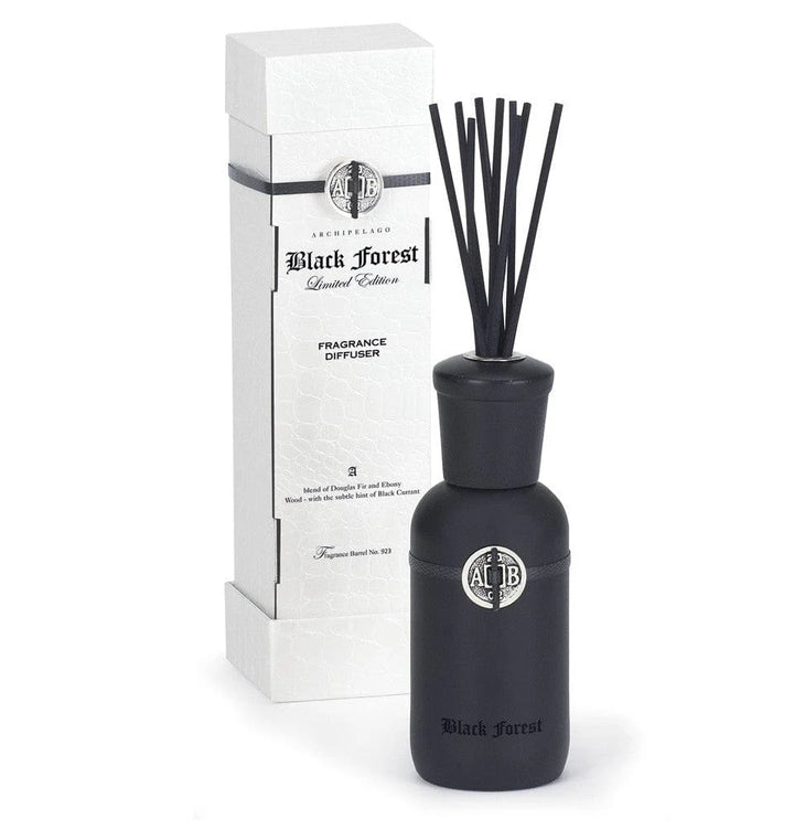 Fragrance diffuser with packaging on a white background