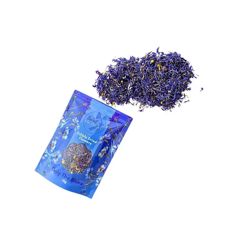 Edible dried flowers in a blue packaging on a white background