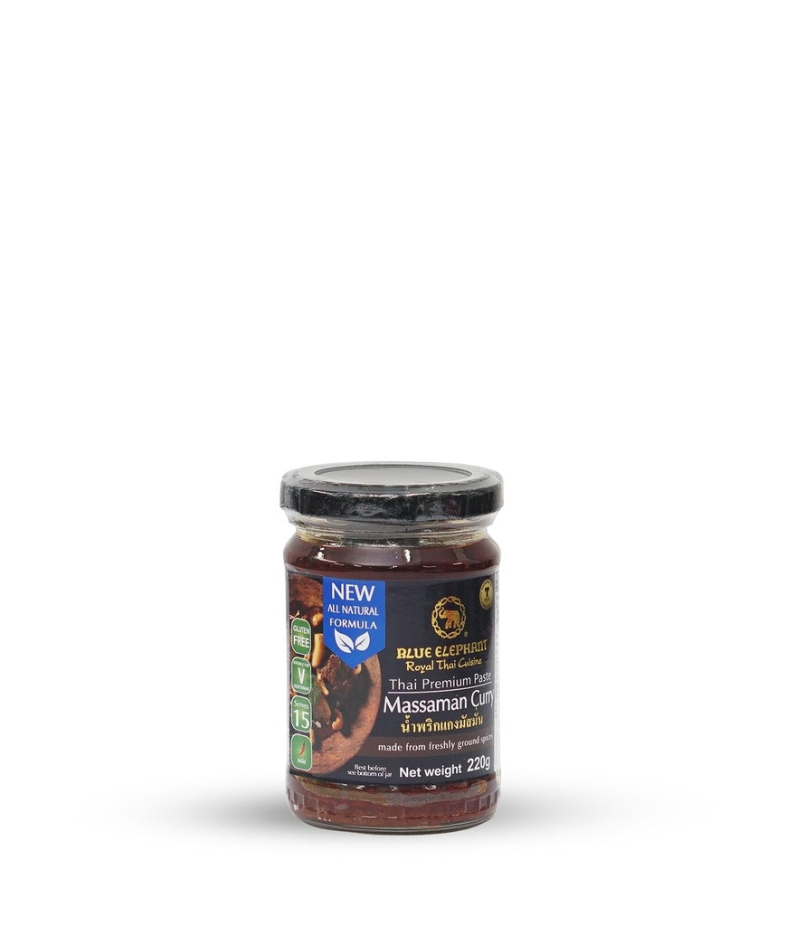 A jar of blue elephant massaman curry paste on a white background