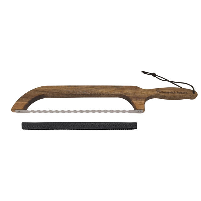 Wooden bread knife with a black blade on a white background