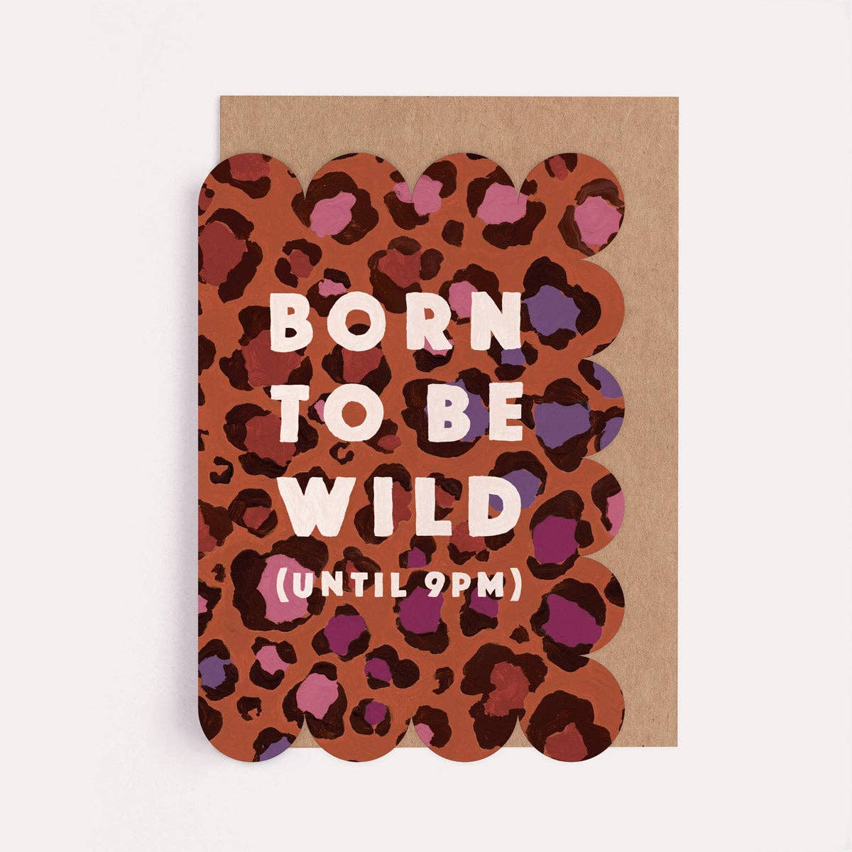 Card with leopard print design and text 'Born to be wild (until 9 PM)' on a brown background