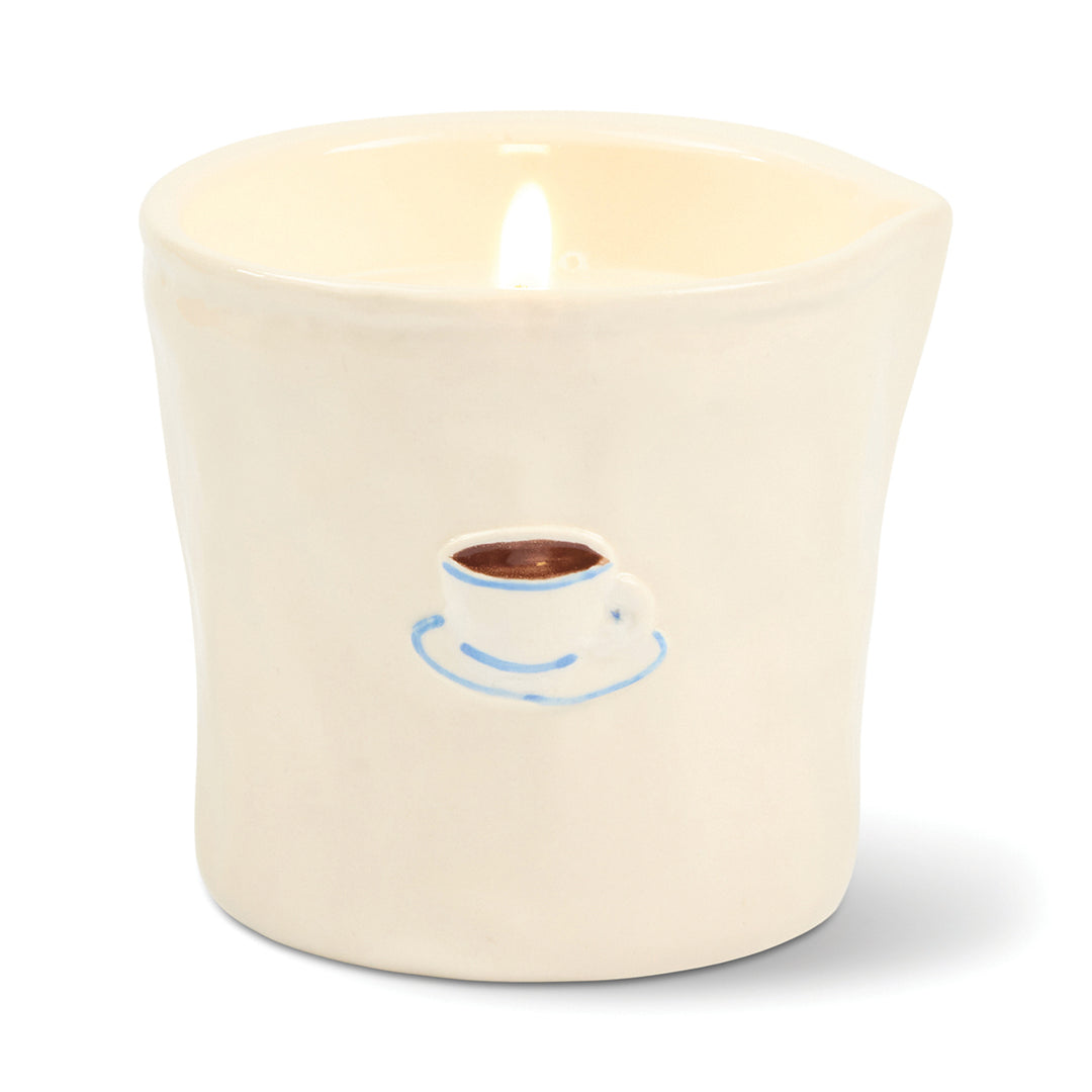 Ceramic candle holder with a coffee cup design on a white background