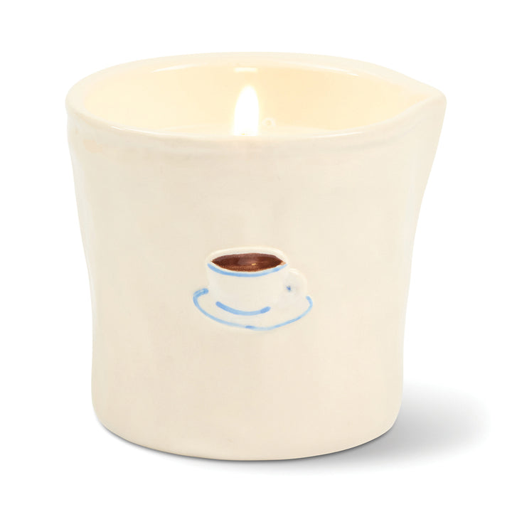 Ceramic candle holder with a coffee cup design on a white background